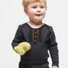 Image of Black Onesie with Golden Trim